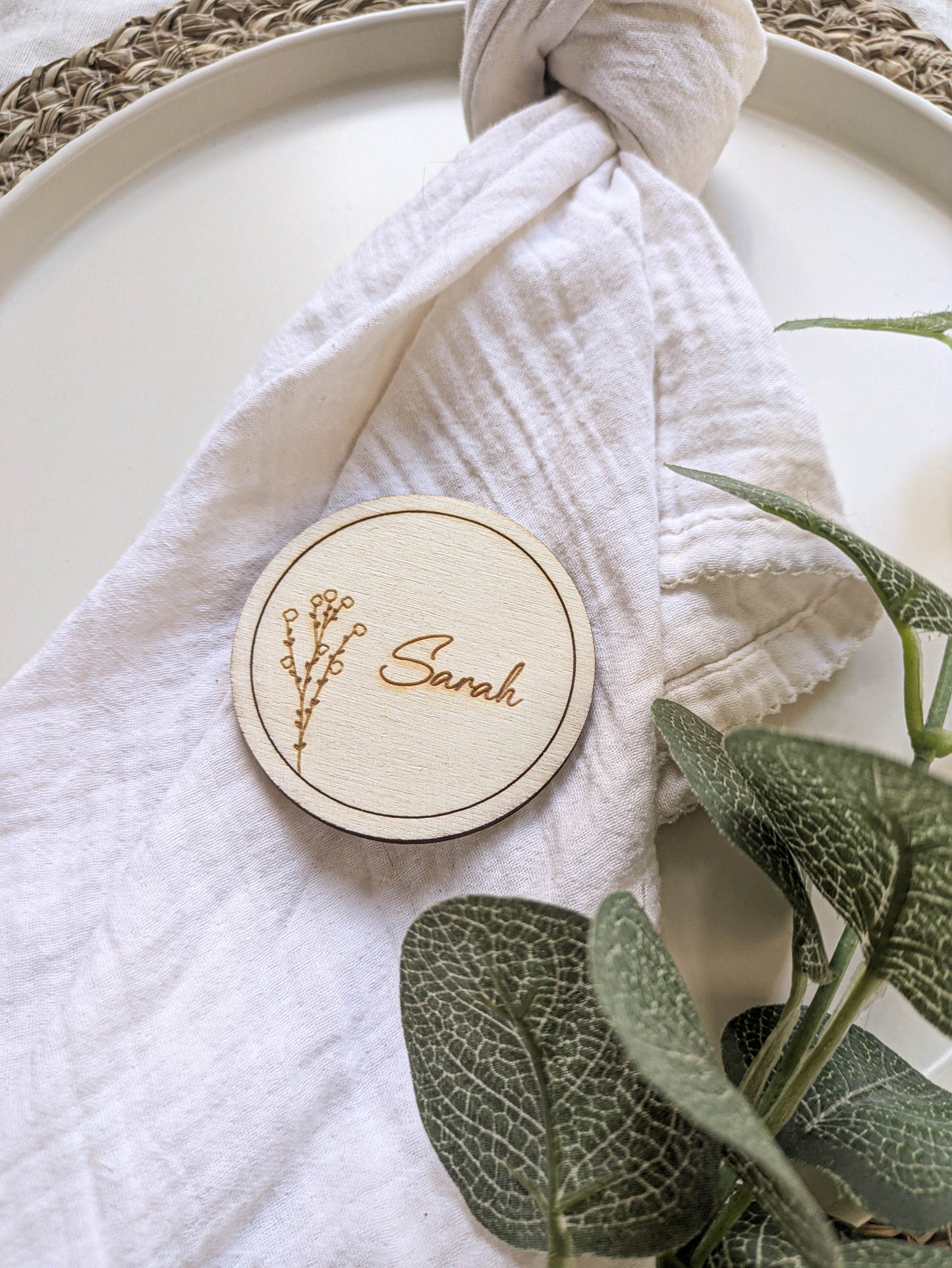 Round wooden wedding place setting decor with engraved name