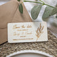 Engraved wooden save the date card styled with kraft envelope