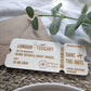 Personalised wooden boarding pass wedding announcement with engraved travel details