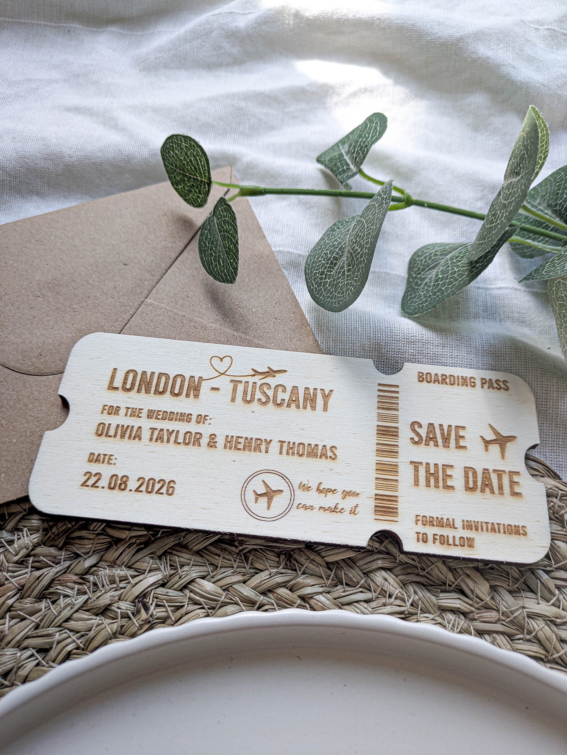 Personalised wooden boarding pass wedding announcement with engraved travel details