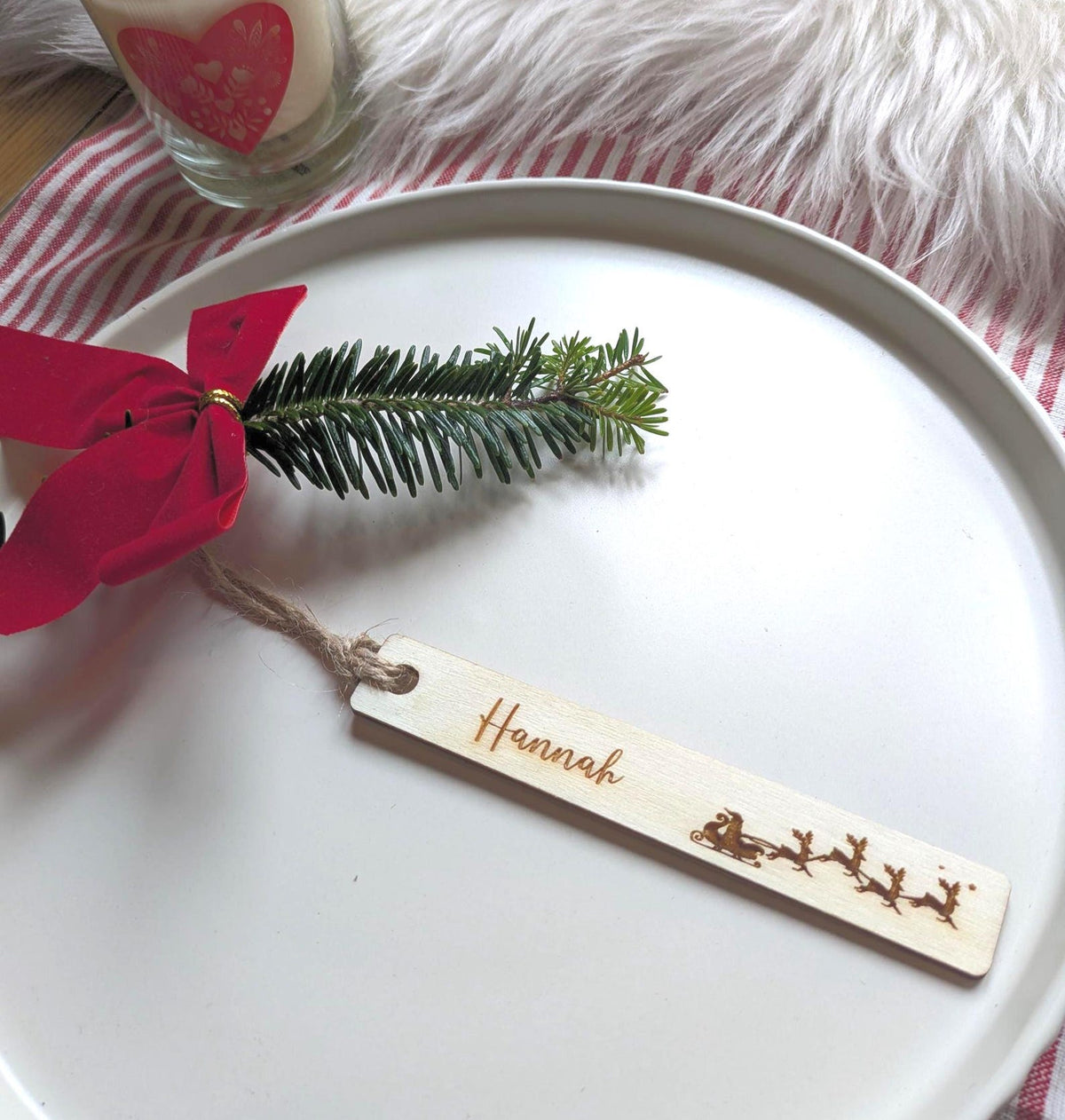Santa Sleigh wooden Christmas place name, engraved Hannah, with jute tie