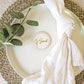 Personalised wooden round place name setting on a rustic wedding table