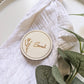 Round wooden wedding place setting decor with engraved name