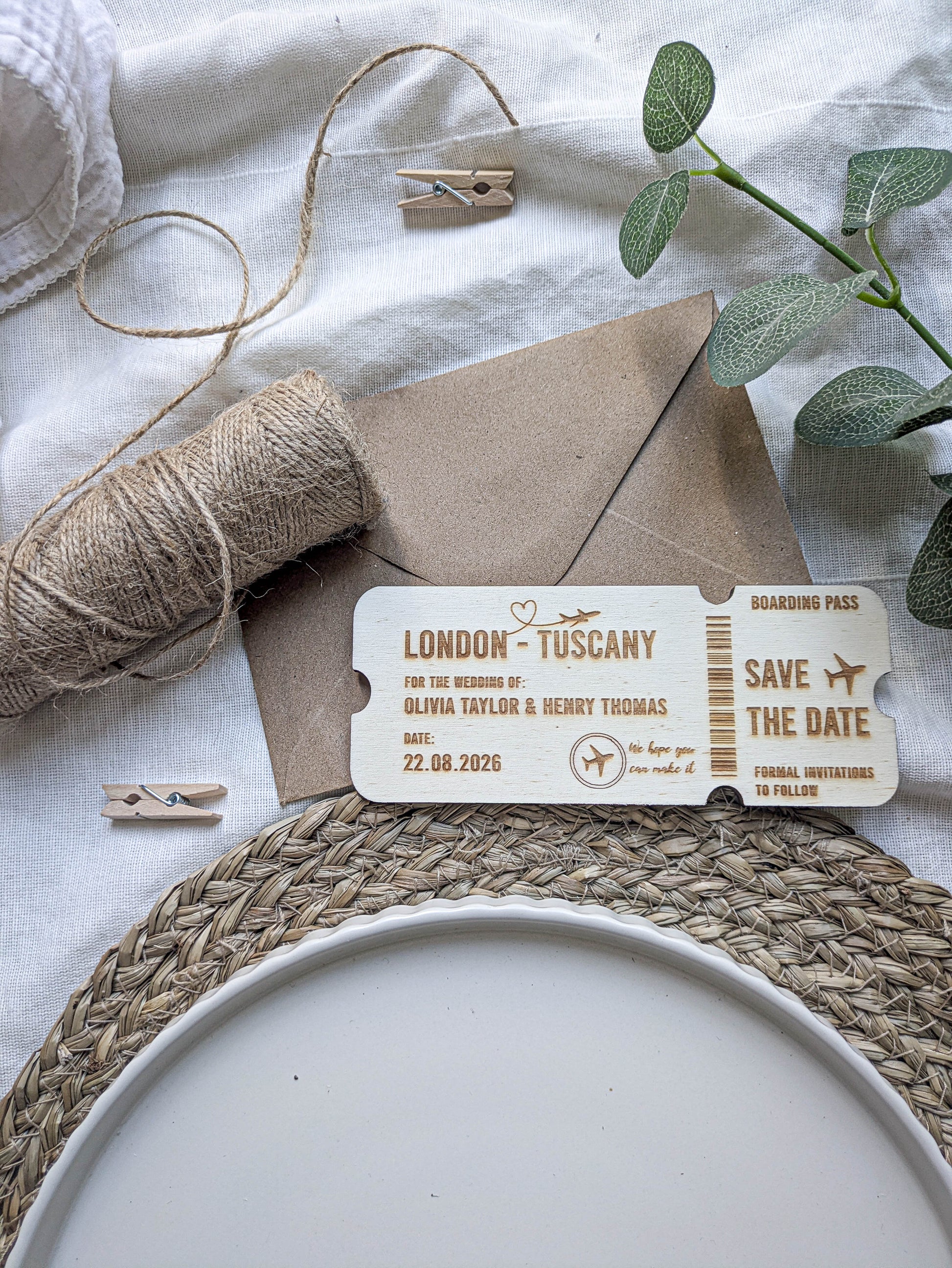 Rustic styling for wooden boarding pass save the date with natural wedding decor