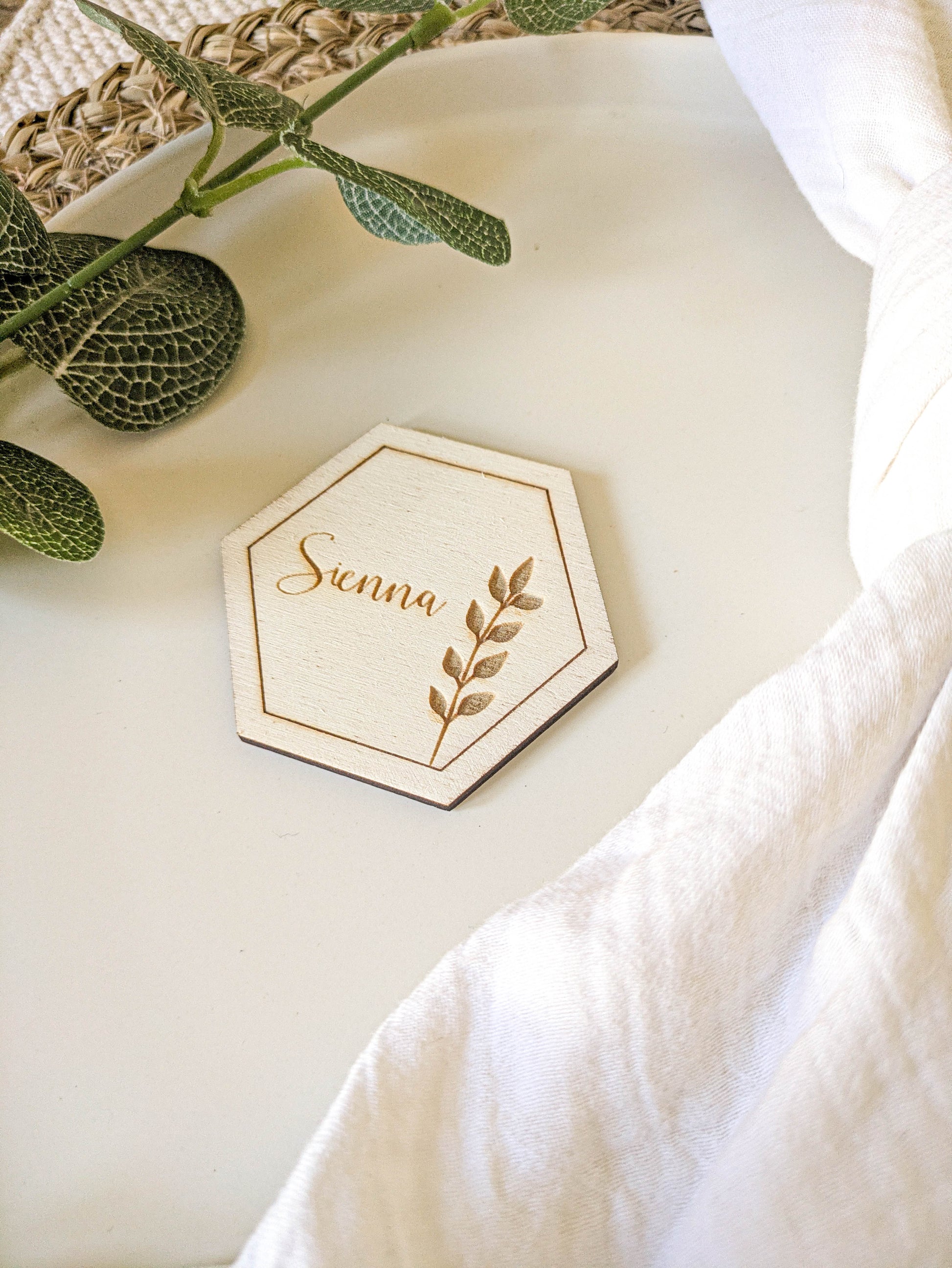 Rustic wooden hexagon wedding place card with personalised guest name