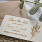 Rustic wooden wedding save the date card with botanical engraved design