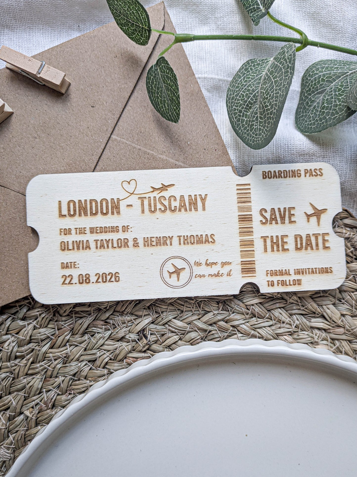 Travel theme wedding save the date engraved onto a wooden ticket design
