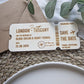 Wooden boarding pass save the date for a London to Tuscany destination wedding